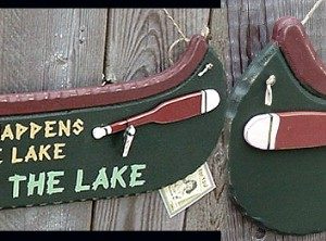 Canoe Shaped What Happens at Lake Stays at Lake Cabin Sign