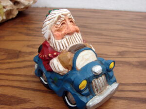 Retired David Frykman Collection Coyne's Santa in Blue Car 1997