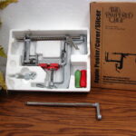 The Pampered Chef Apple Peeler Corer Two Rods and Wooden Stand