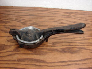 Antique 2 Part Cast Iron X-Ray Lemon Juicer Squeezer Hand Held