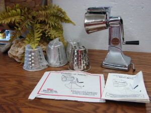 Like New West Bend Vintage Manual Food Processor  Cuisine-O-Matic 5 Shredding Cones