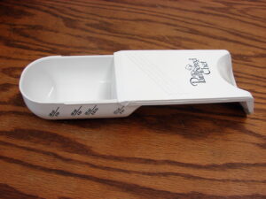 Like New Retired Pampered Chef Sliding Adjustable 1/2 Cup Measuring Spoon